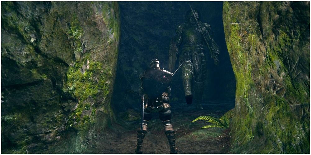 Dark Souls warrior in narrow passage with Stone Guardian