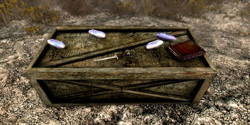 box with some soul gems and a book lying on top from skyrim
