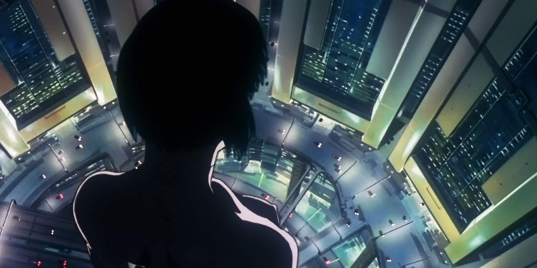 Kusanagi stands above the city in Ghost in the Shell