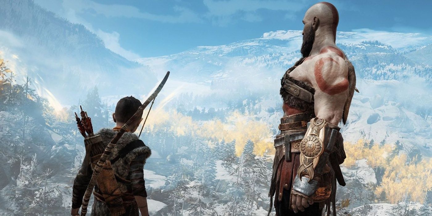 Kratos and Atreus look at the world in God of War
