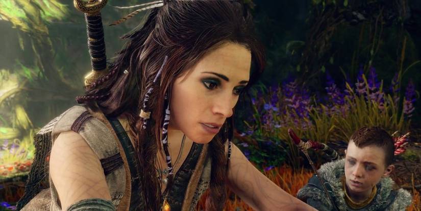 Freya heals a beast in God of War