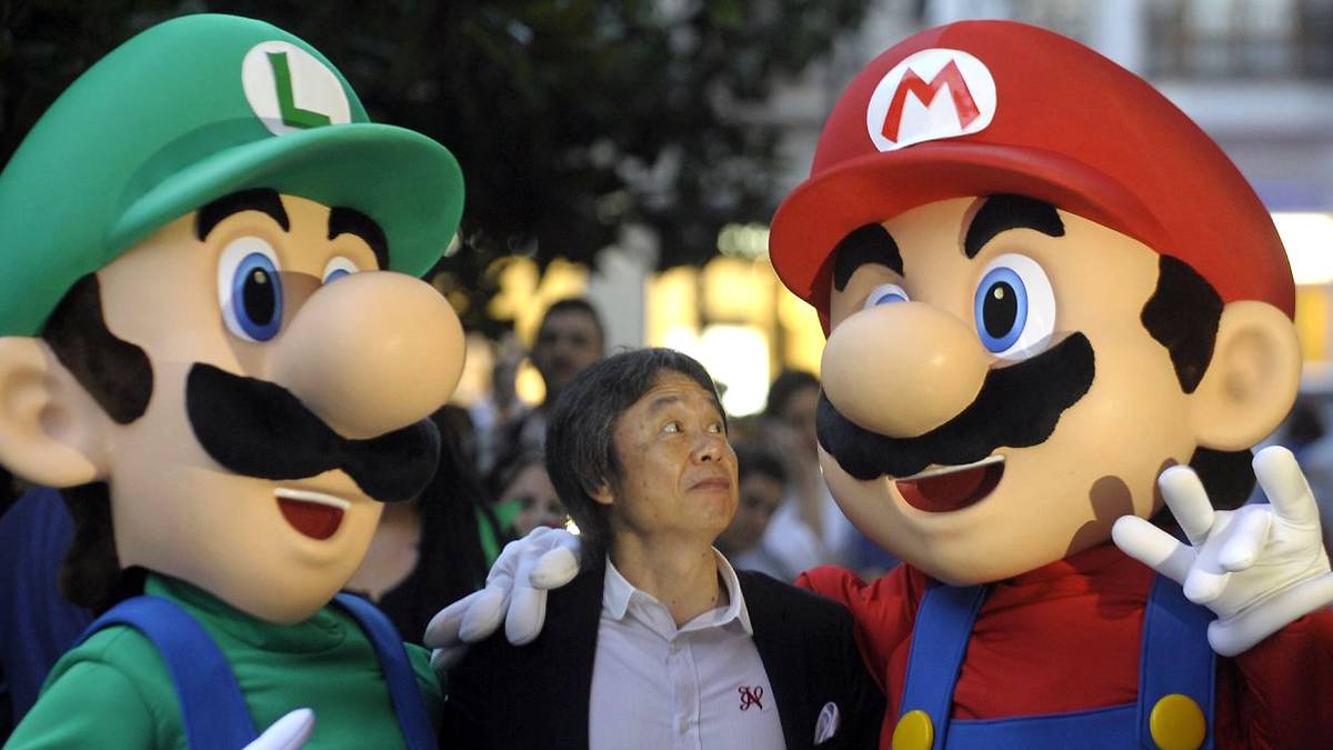 Shigeru Miyamoto with Mario and Luigi