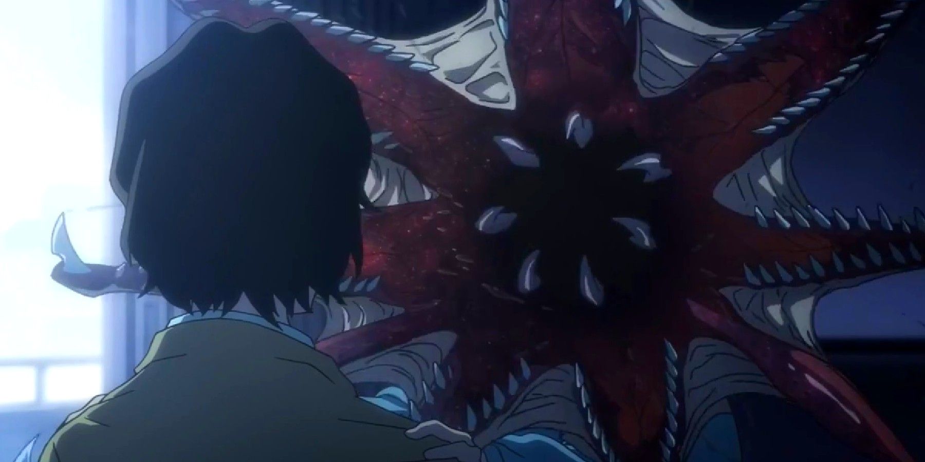 a grotesque monster opens its mouth and attacks a person in this anime