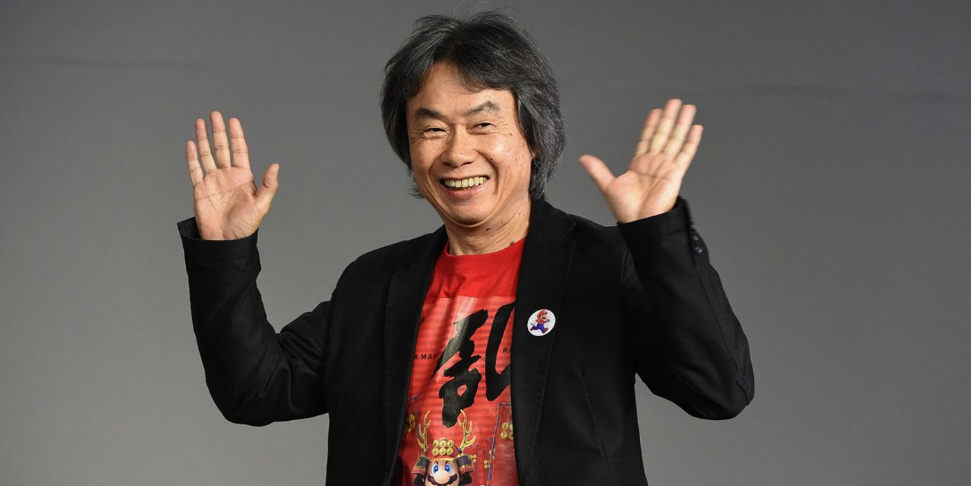 miyamoto hands raised