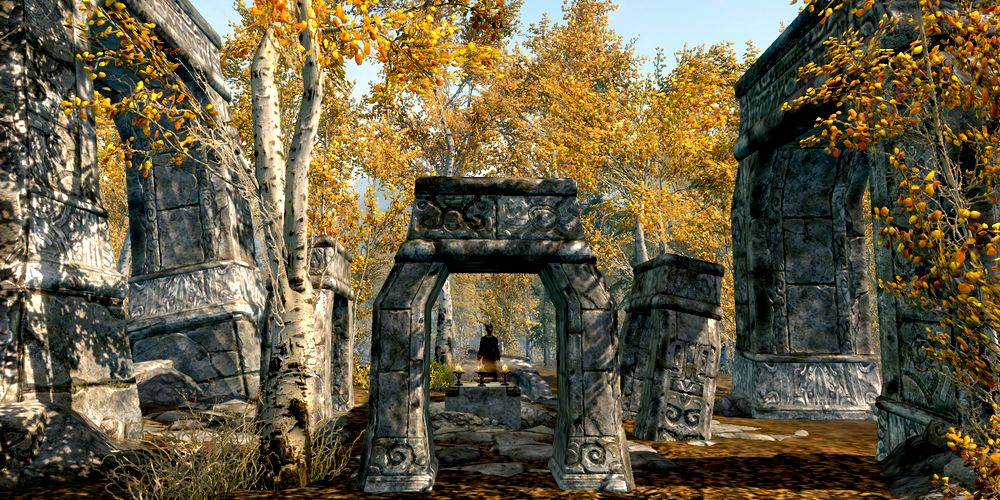 mage by a stone altar surrounded by yellow trees