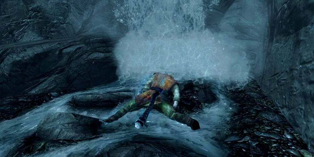 dead body of a khajiit under a waterfall