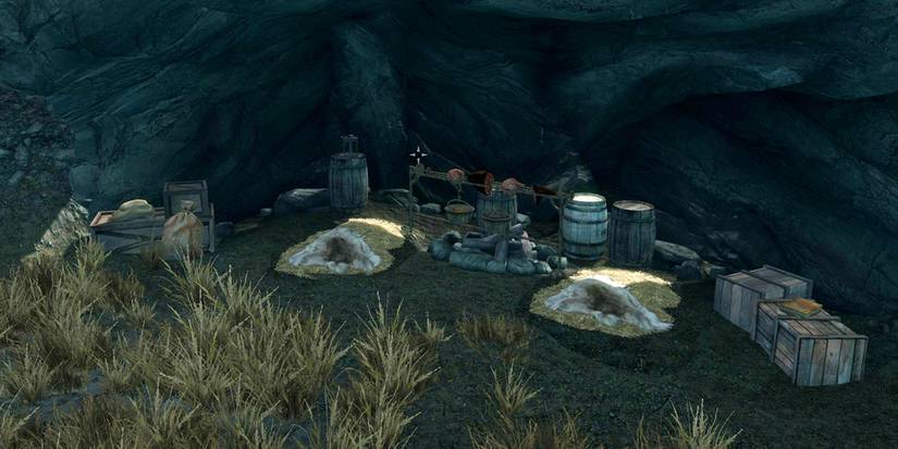 stone overhang with smuggled goods and a cooking station