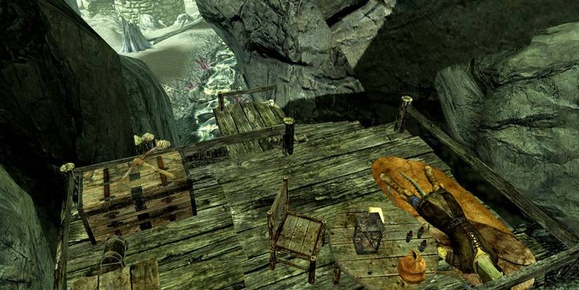 camp of an argonian in a rocky pass