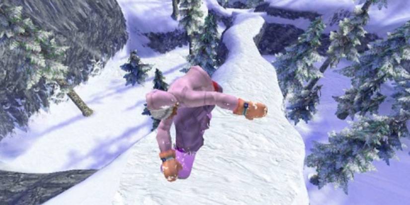 Flying down a snowy mountain doing a trick in 1080 Avalanche