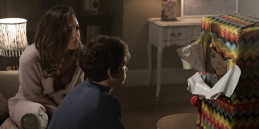 A Chucky doll is opened