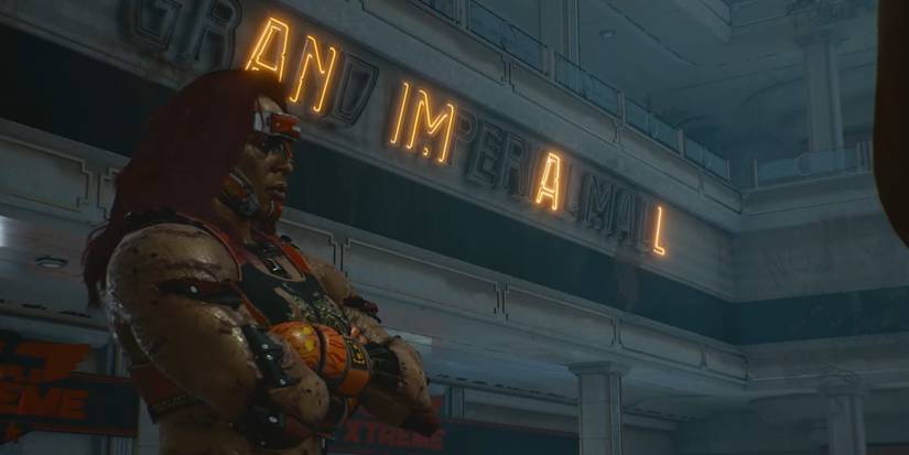 Boss of The Animals in front of their sign