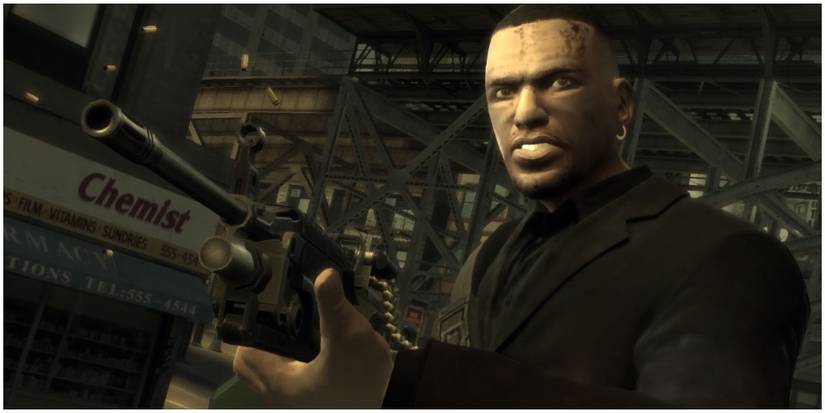 Luis Fernando Lopez aiming a machine gun while in combat