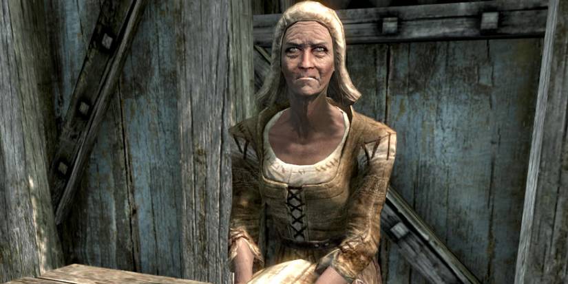 Olava the Feeble sitting on a bench