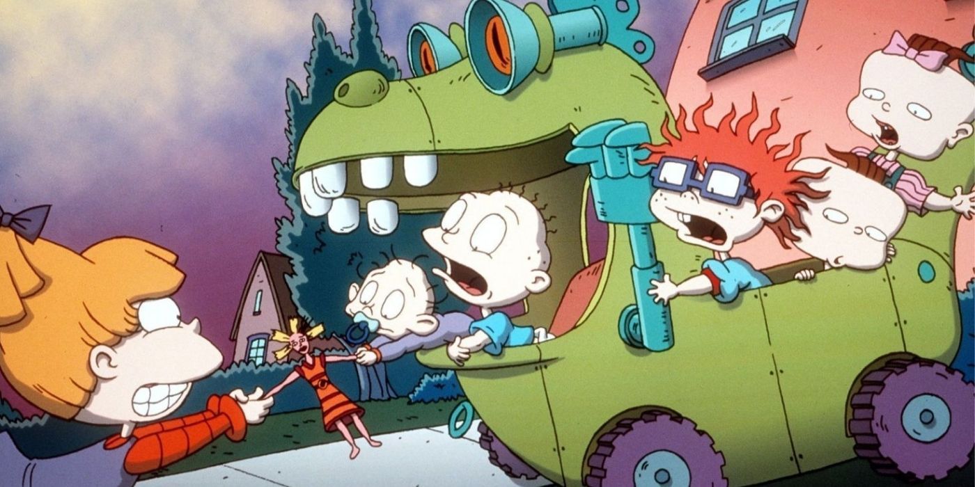 Rugrats characters in a car shaped like a dinosaur