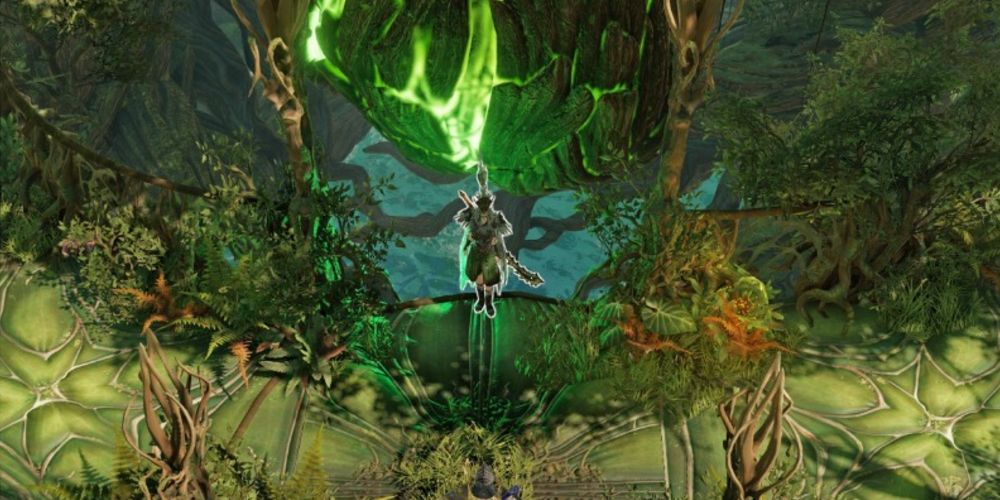 Divinity protagonist standing by the heart of the Mother Tree