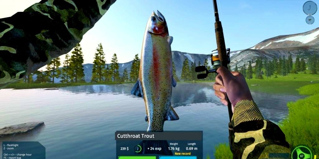 player catching a fish in a lake by some woods