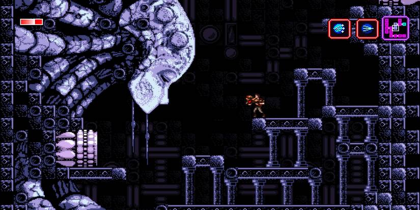 Overlooked giant robotic head boss on ledge in axiom verge
