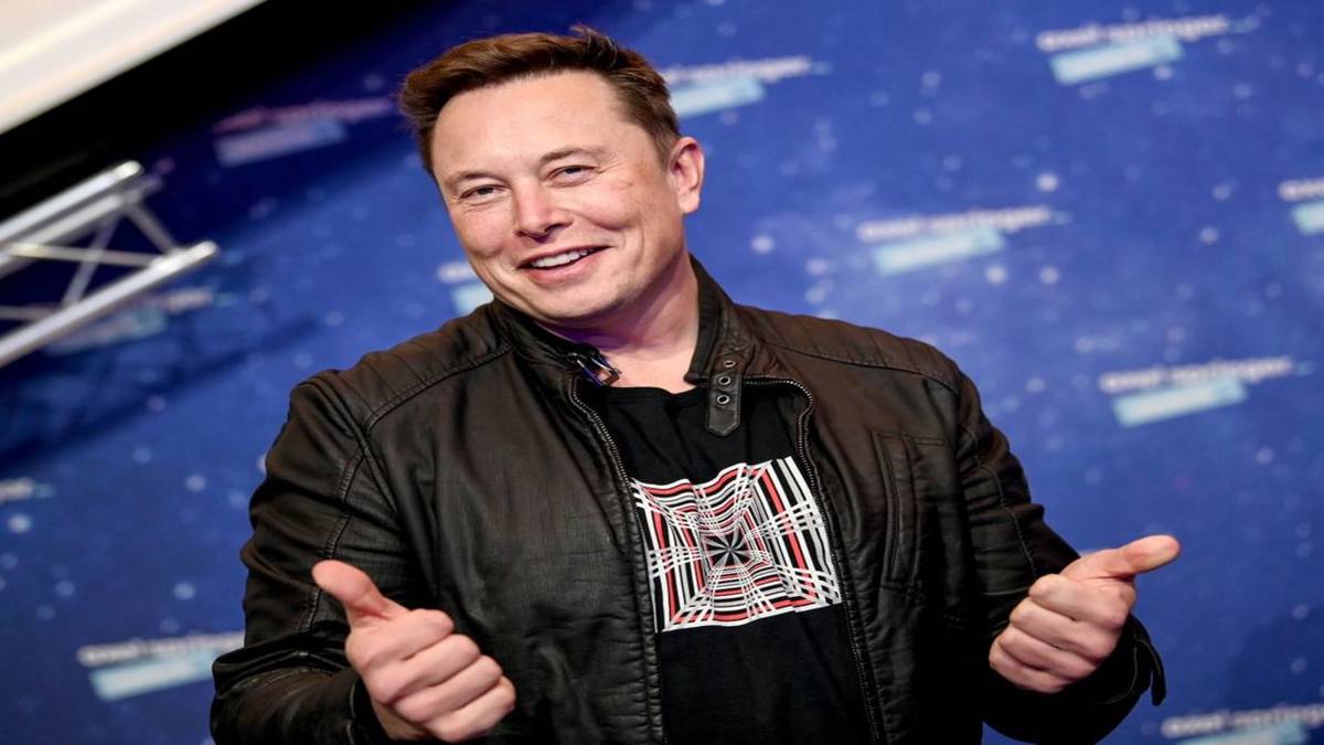 elon musk with two thumbs up