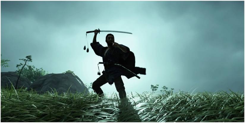 jin sakai holding his sword over his head in a battle stance.