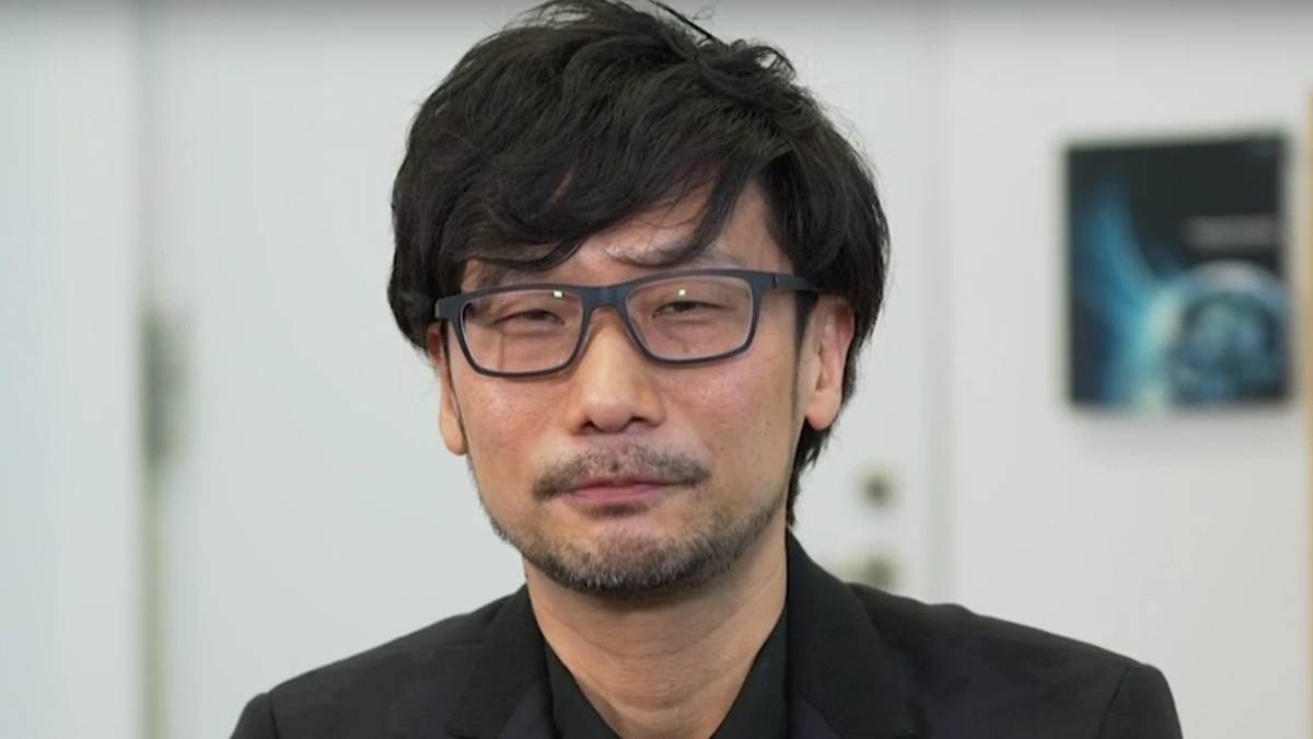 hideo kojima black suit white room glasses