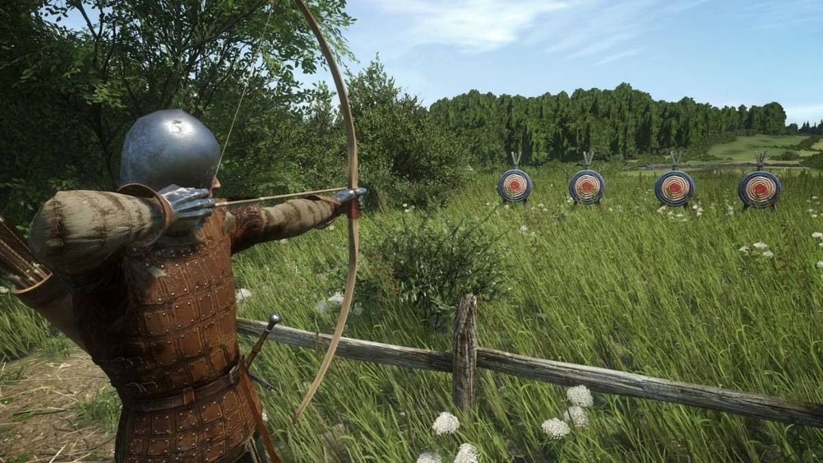 Medieval archer aiming at targets