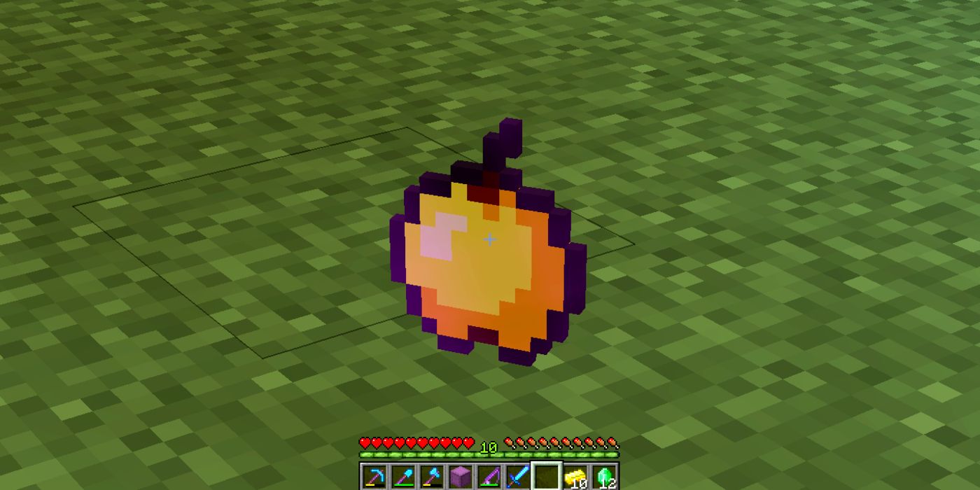 an apple on the ground.