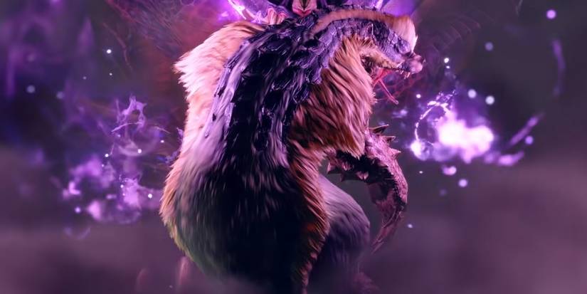 magnamalo with arzuros in its mouth