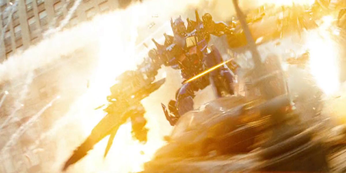 optimus charging through decepticons while surrounded by explosions as he decimates them