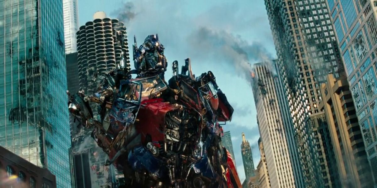 optimus giving a speech after the war with his right arm ripped off