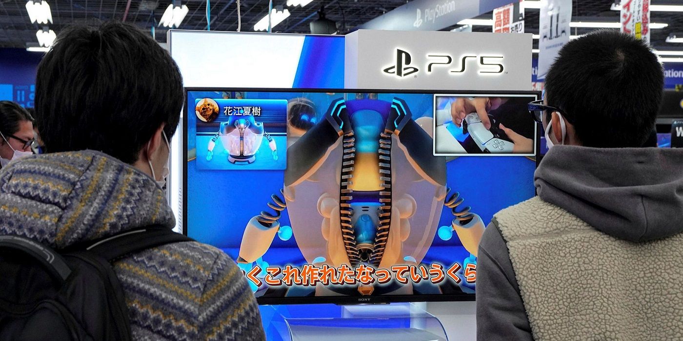 Masked gamers in Japan play a PS5