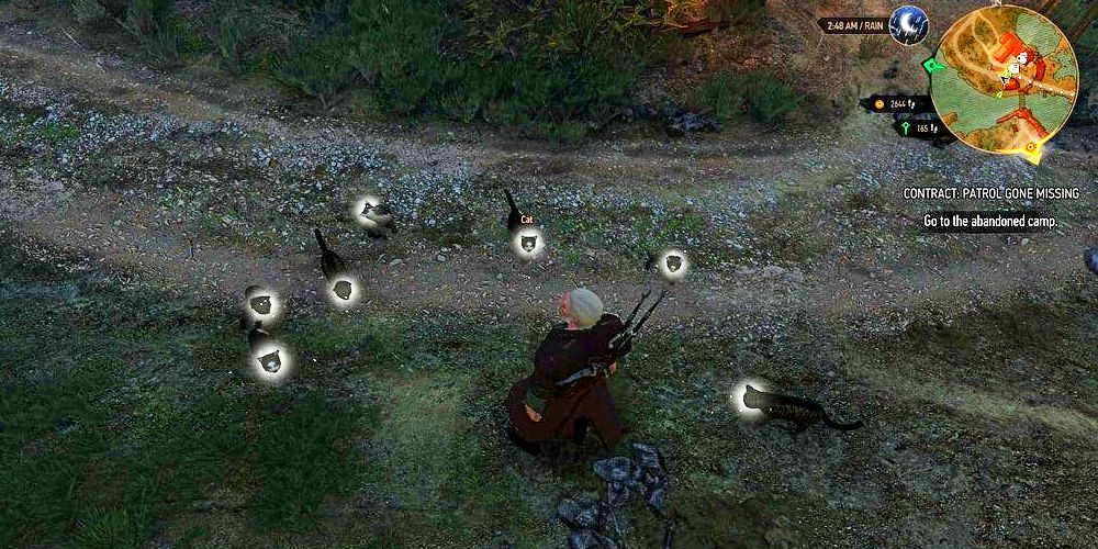 geralt using a magical sign on cats to make them follow him