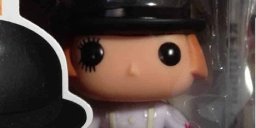 Alex's stoic visage with the trademark make-up on his right eye.