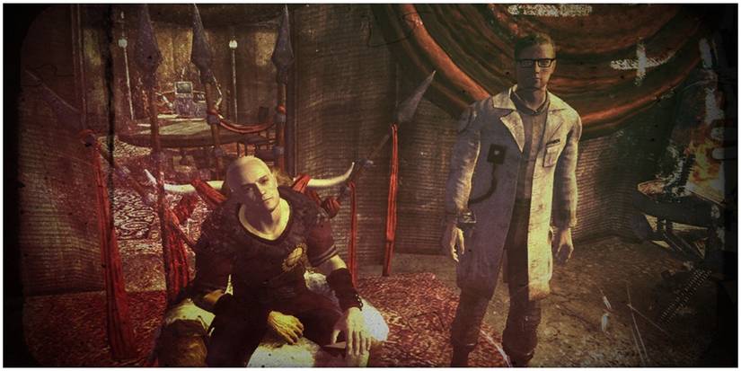 Arcade standing next to Caesar in Caesar's tent