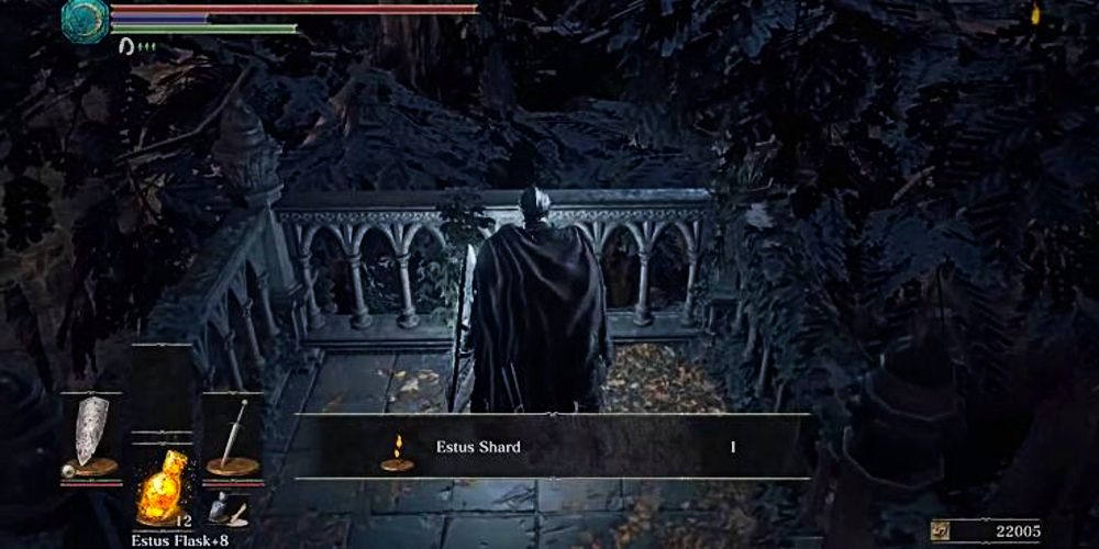 corpse that can be looted for the estus shard on a railing.
