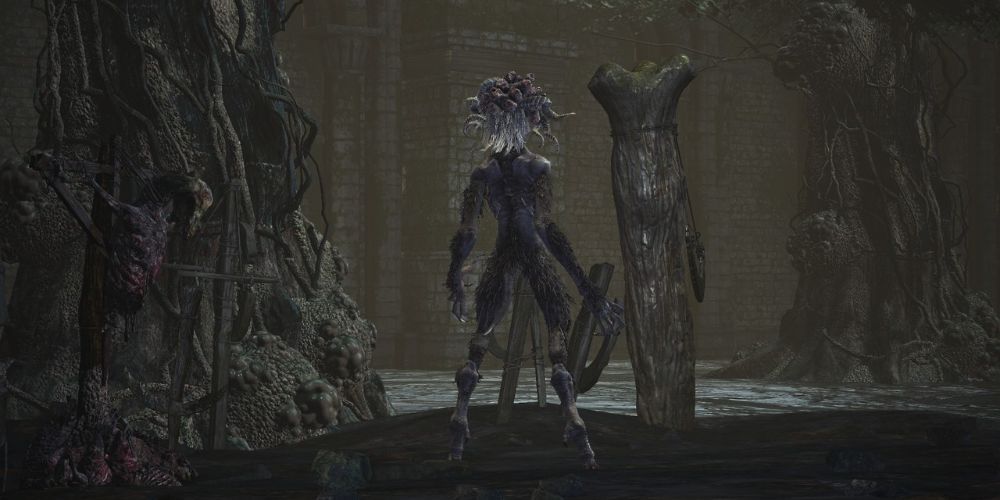 Гхру-берсерк терпеливо ждет, чтобы нанести удар в Dark Souls III