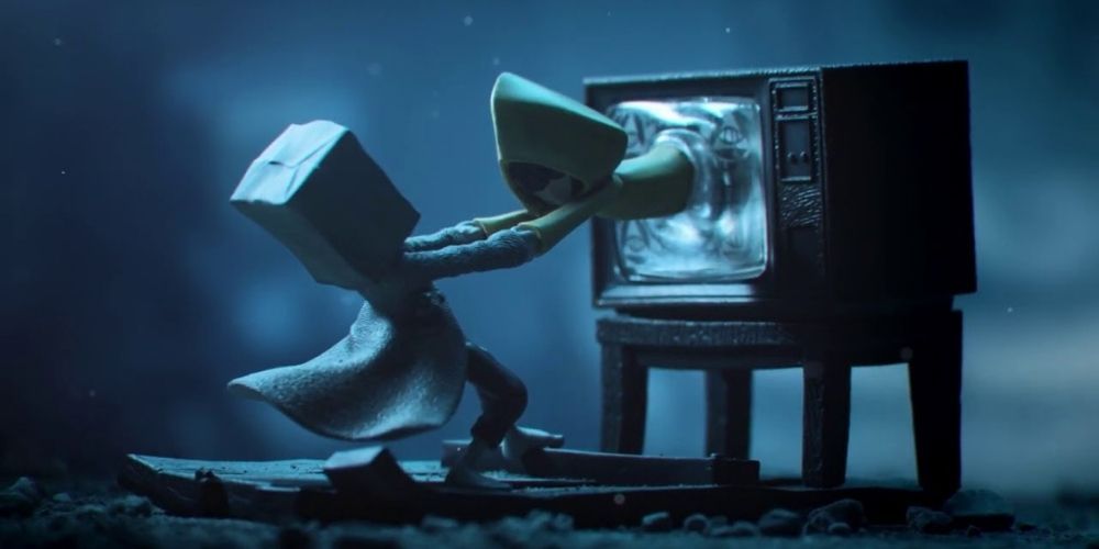 Little Nightmares 2 Mono Pulling Six Out of TV Screen