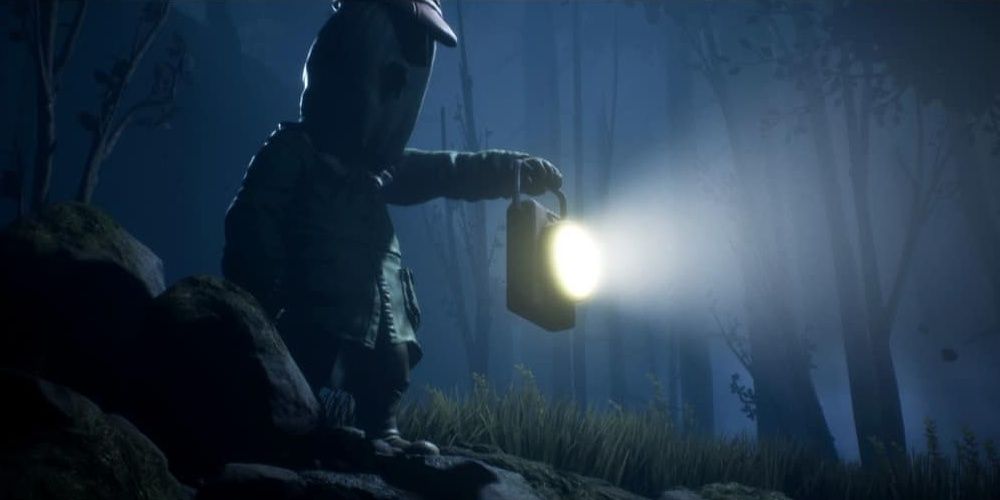 The Hunter searches the darkness with his lantern