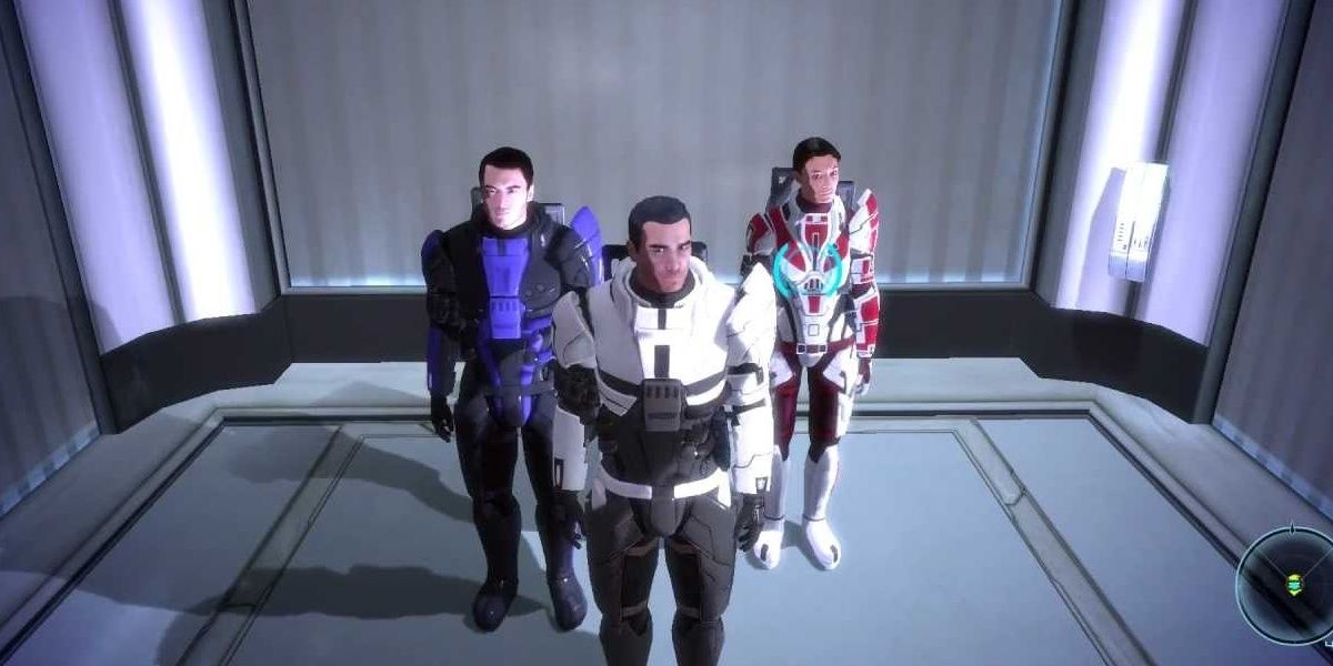 Shepard and his squad ride an elevator in Mass Effect