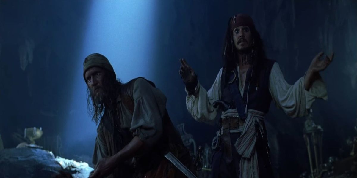 Jack standing behind barbossa's man just before kicking him into the water