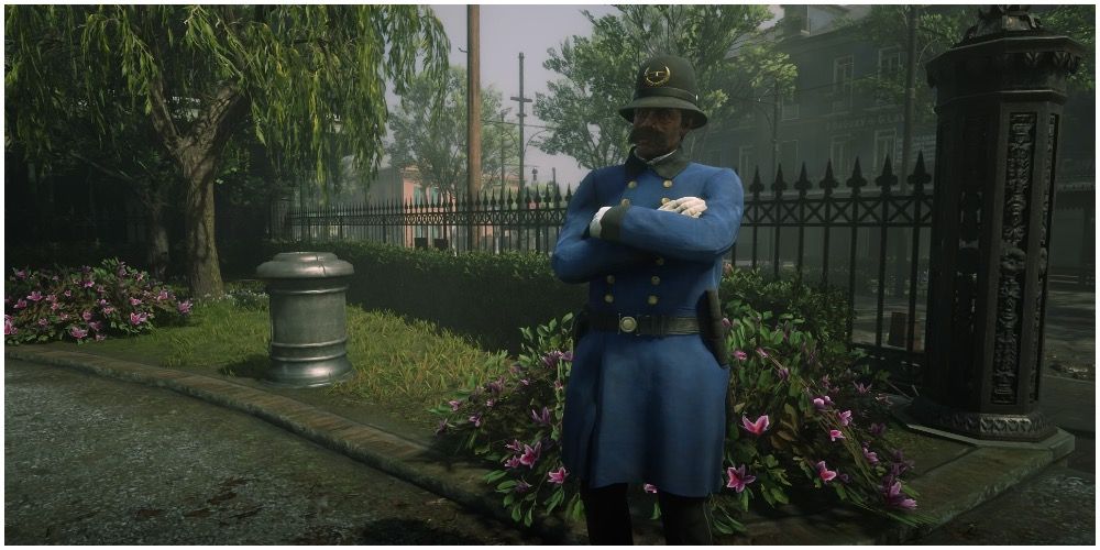 A police officer standing guard inside a park
