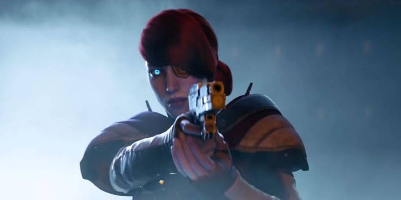 Petra Venj aiming a gun