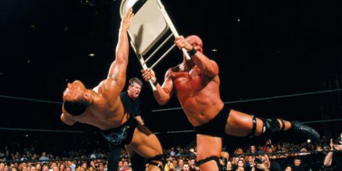 Stone Cold Steve Austin Hitting The Rock With A Chair From Wrestlemania 17