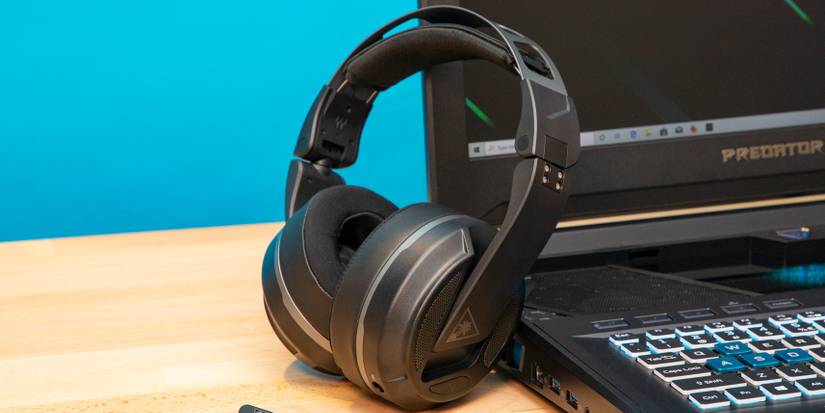 Turtle Beach headphones leant up against a laptop
