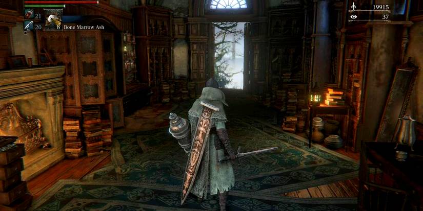 player holding the blade in hunter's dream's workshop.