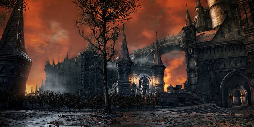outside lothric castle showing the red sky.