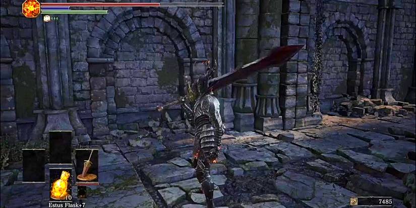 player in black knight armor holding an ultra greatsword.