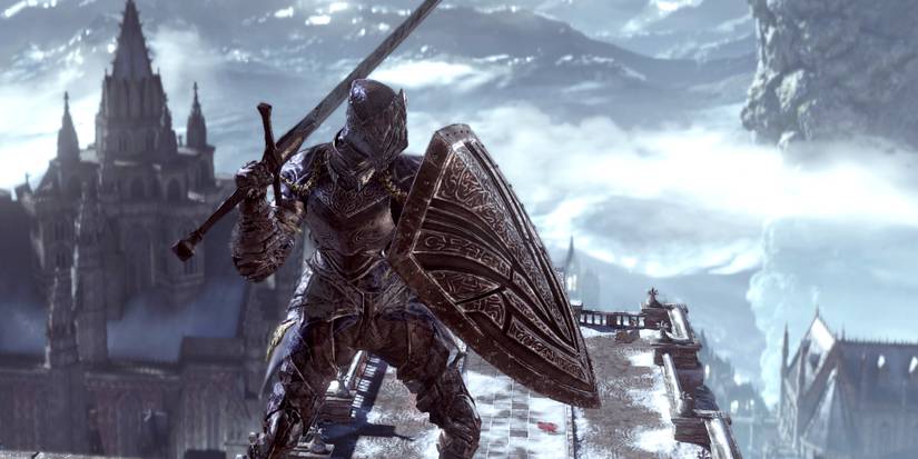 player holding up a black knight shield.