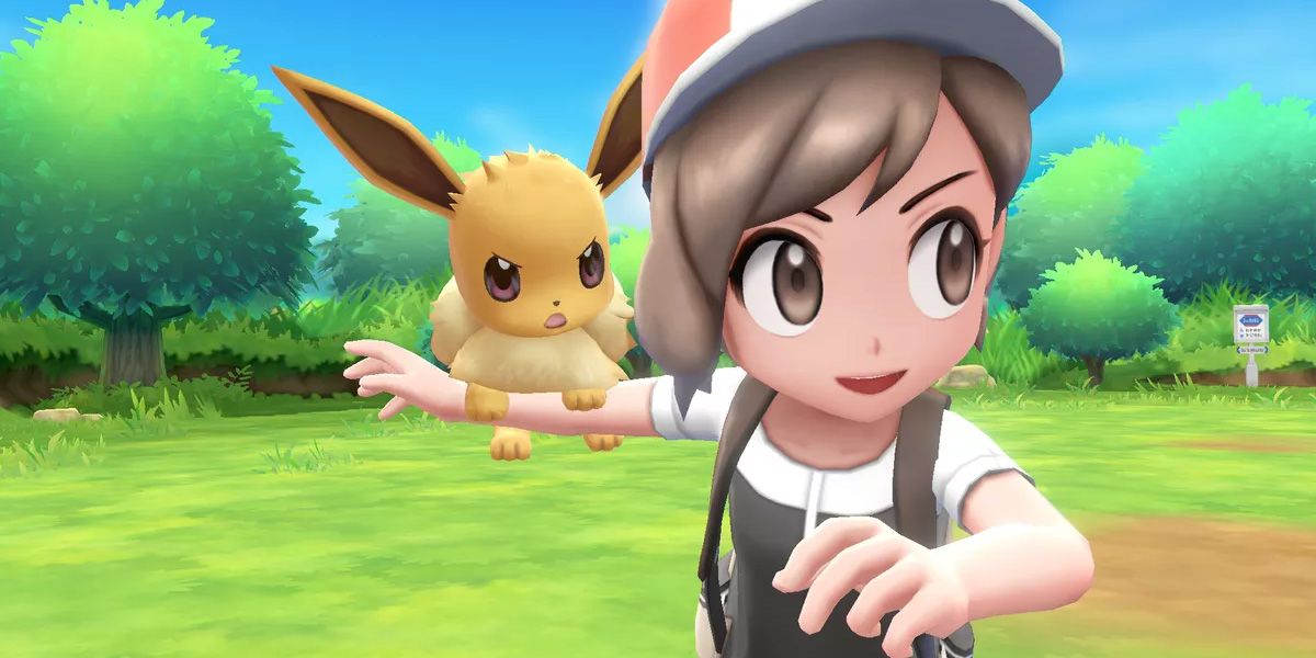 Eevee and the female trainer from Pokemon: Let's Go, Eevee!
