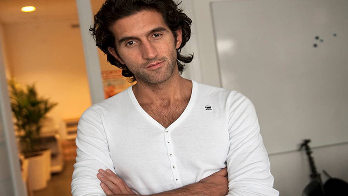 image of josef fares with arms folded