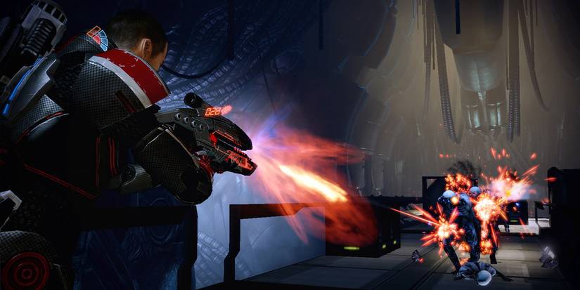 Mass Effect 2 Commander Shephard shooting husks